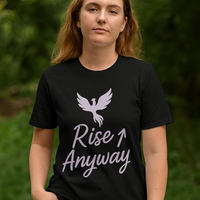 Person wearing a black t-shirt with a white dove and text design against a blurred green background