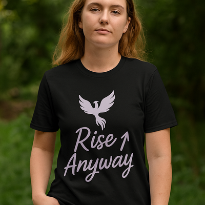 Person wearing a black t-shirt with a white dove and text design against a blurred green background