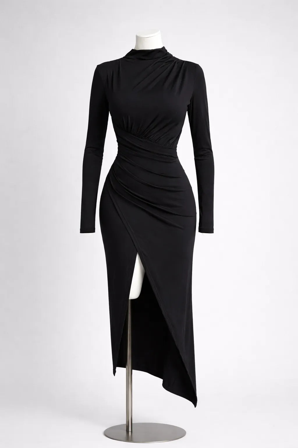 Black dress on a mannequin against a white background