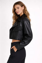Woman wearing a black leather jacket on a white background